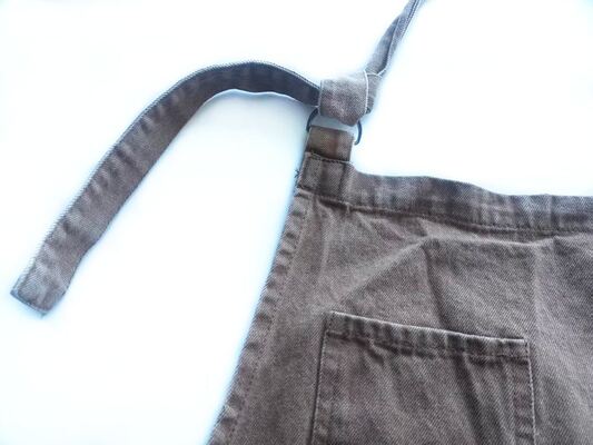 Durable 100 percent cotton heavy woven jeans fabric APRON with 280gsm weight solid color garment washed design suitable for men and women casual