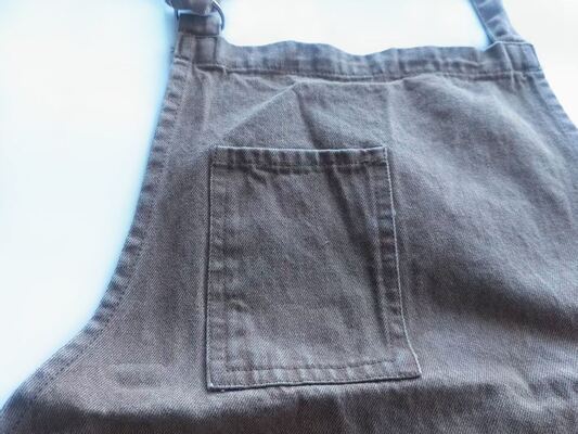 Durable 100 percent cotton heavy woven jeans fabric APRON with 280gsm weight solid color garment washed design suitable for men and women casual