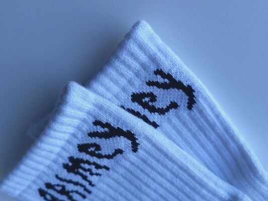 Durable SOCKS for sports featuring jacquard technology yarn dyed pattern and sweat absorbent cotton terry material for mens and womens comfort